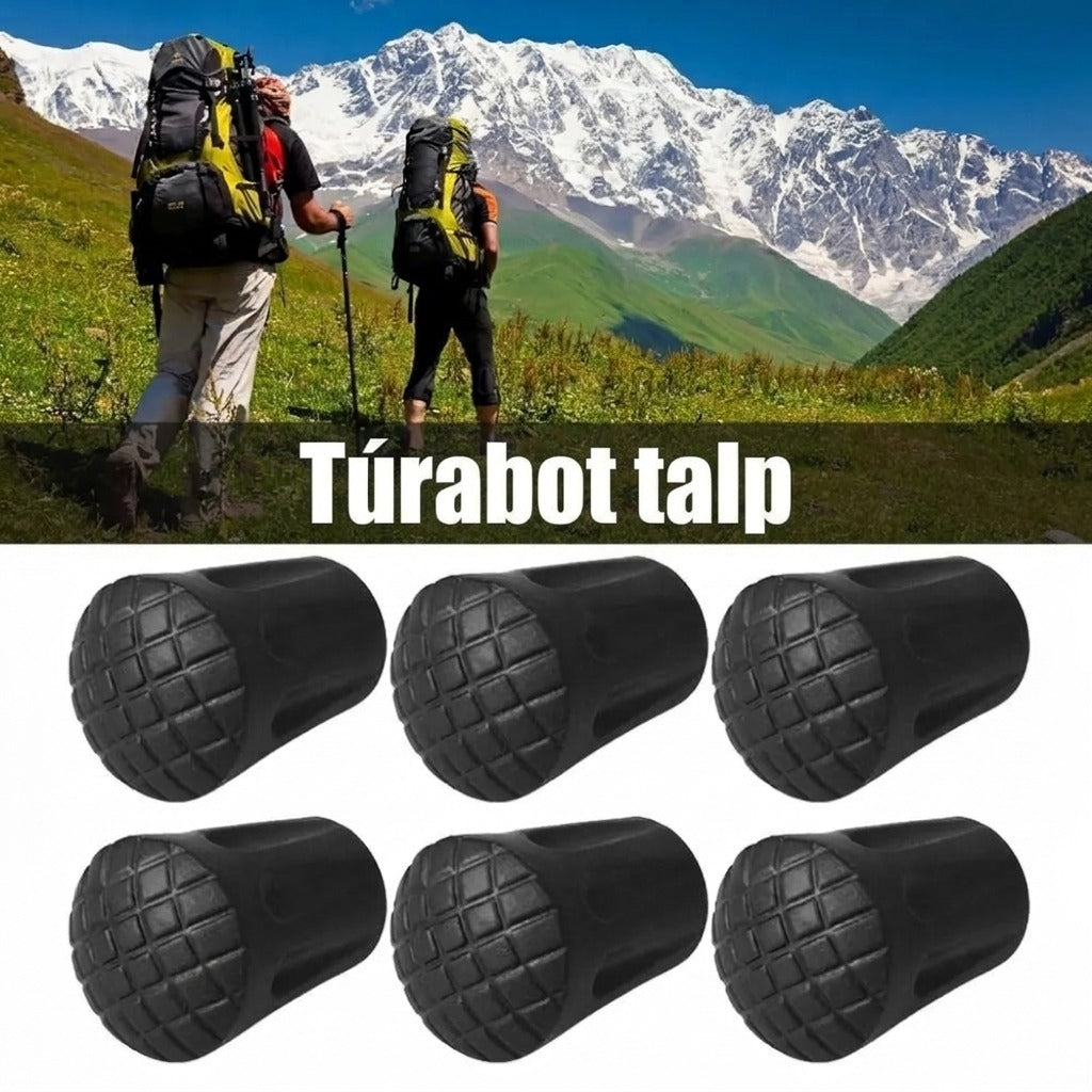 Fekete gumitalpak túrabothoz, háttérben hegyekben kiránduló túrázókkal.
