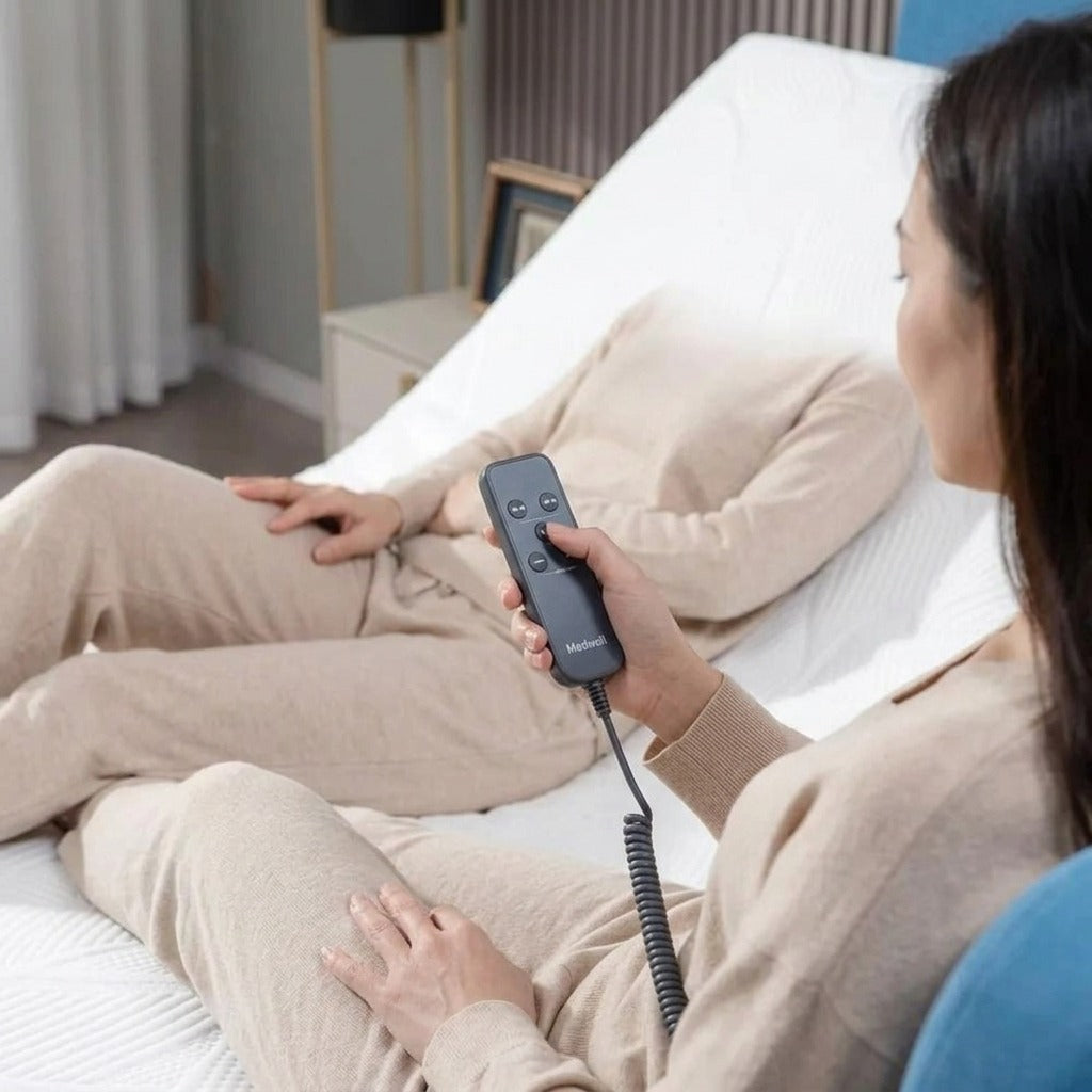 Electric Adjustable Bed with Memory Foam Mattress - in use