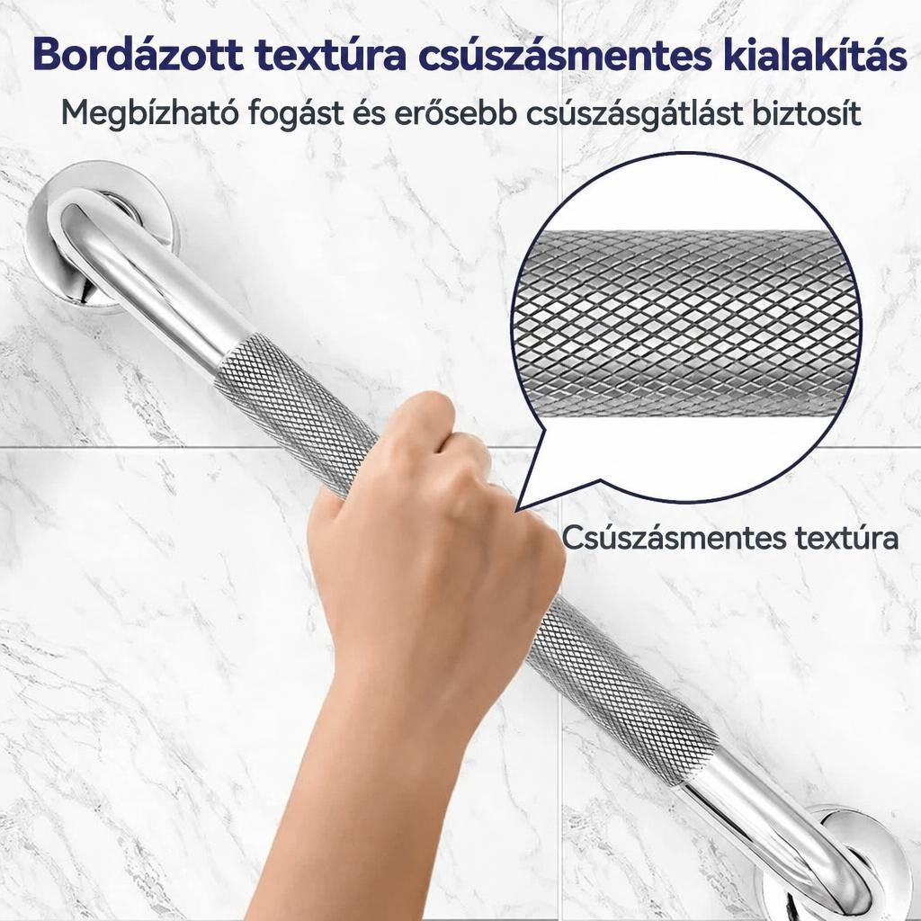 Bordázott felületű, csúszásmentes fém kapaszkodó kézzel fogva a fürdőszobában.