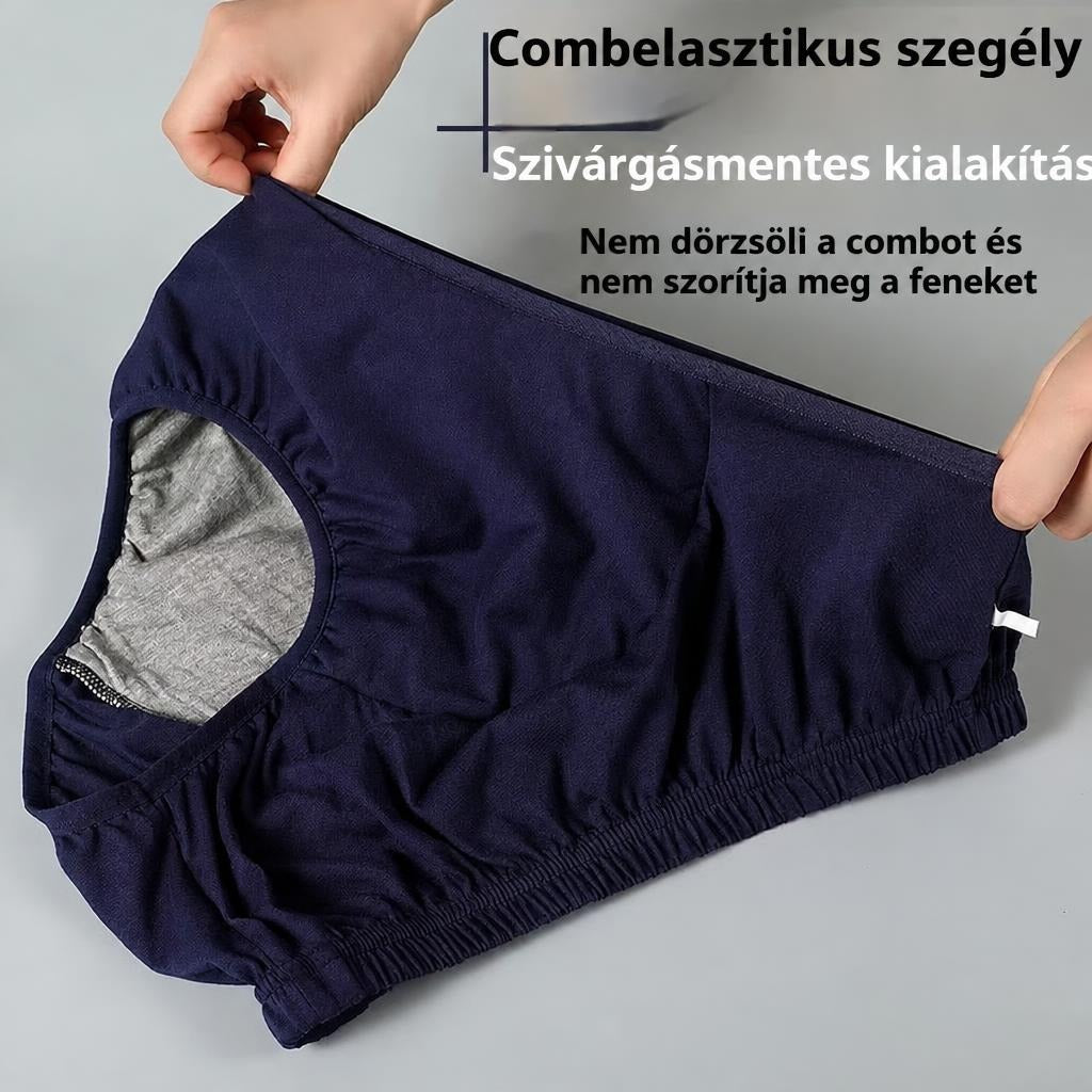 Rugalmas szegélyű sötétkék fehérnemű combkivágásának bemutatása kézben tartva.