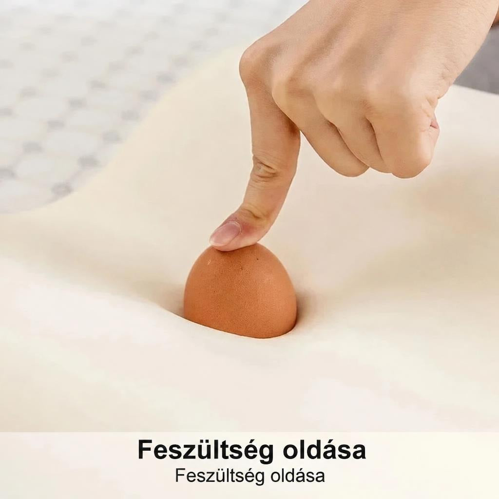Ujj nyom egy tojást a memóriahabba a nyomáseloszlatás és feszültségoldás szemléltetésére.