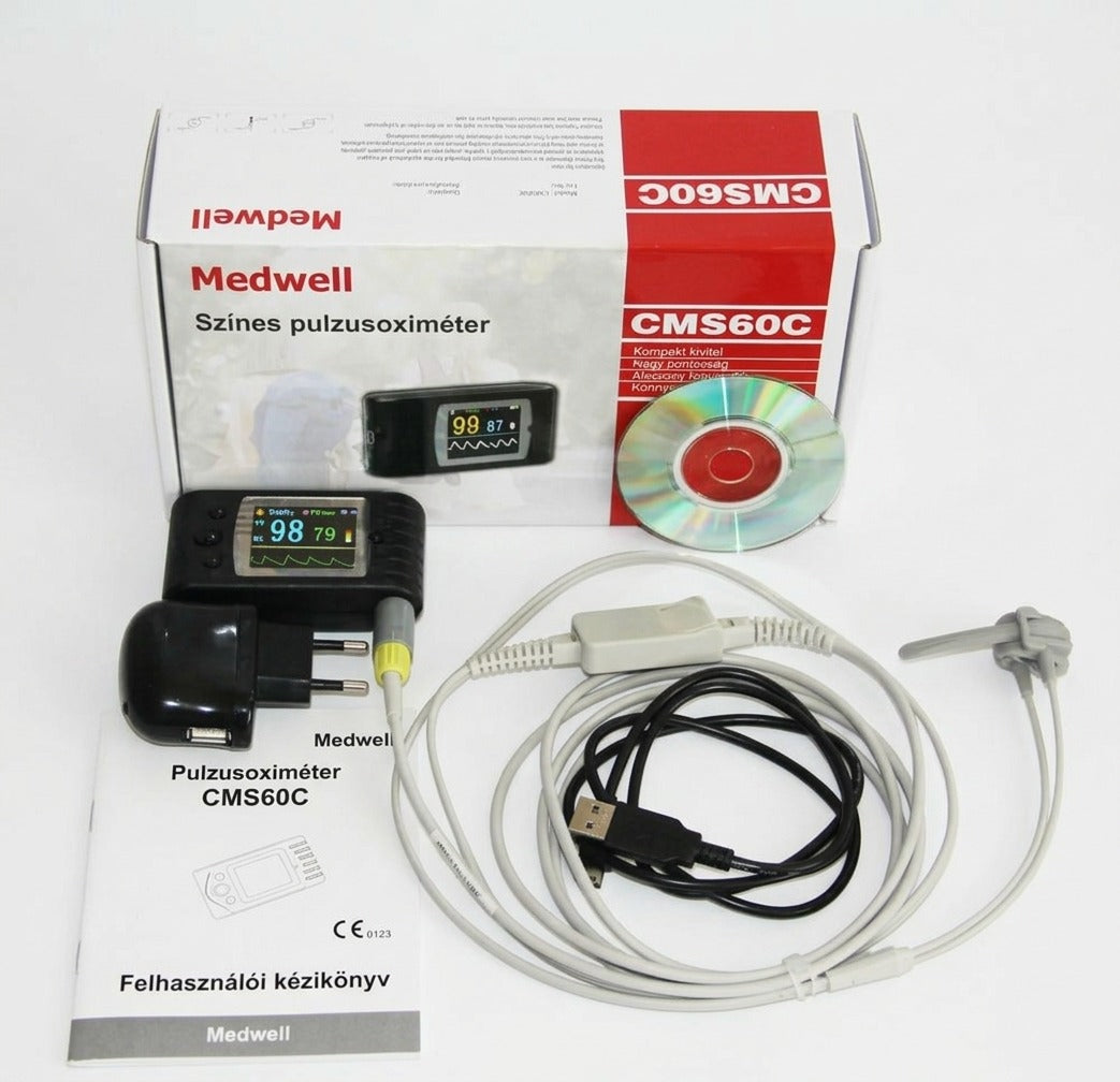 Medwell CMS60C színes pulzusoximéter tartozékaival, dobozával és kézikönyvével.