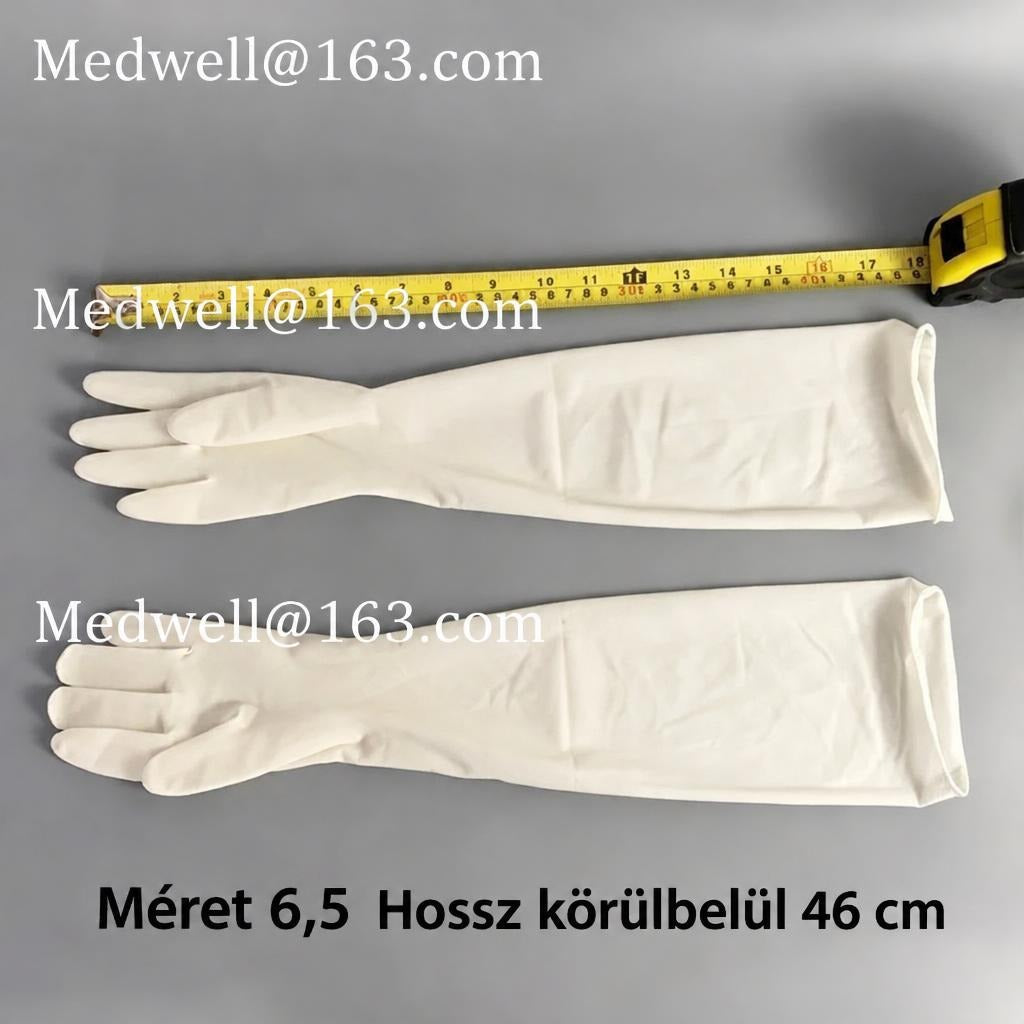 Hosszú szárú fehér gumikesztyű mérőszalaggal lemérve.