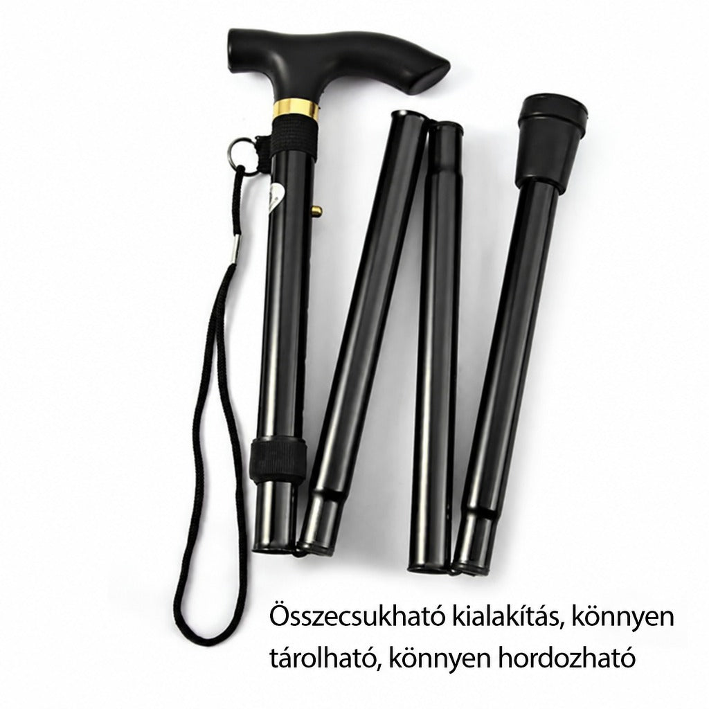 Összecsukott fekete sétapálca csuklópánttal és ergonomikus fogantyúval.