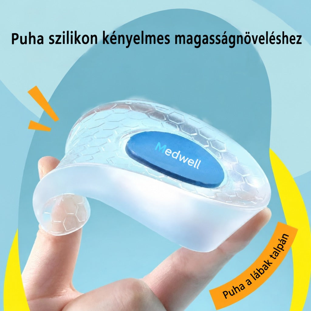 Rugalmas szilikon sarokemelő talpbetét kézben tartva.