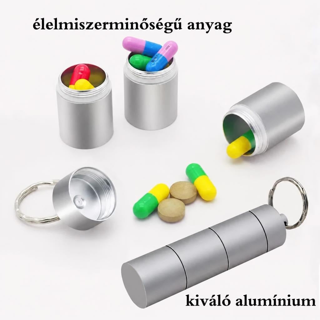 Hordozható, több rekeszes alumínium gyógyszertartó kapszulákkal és tablettákkal.