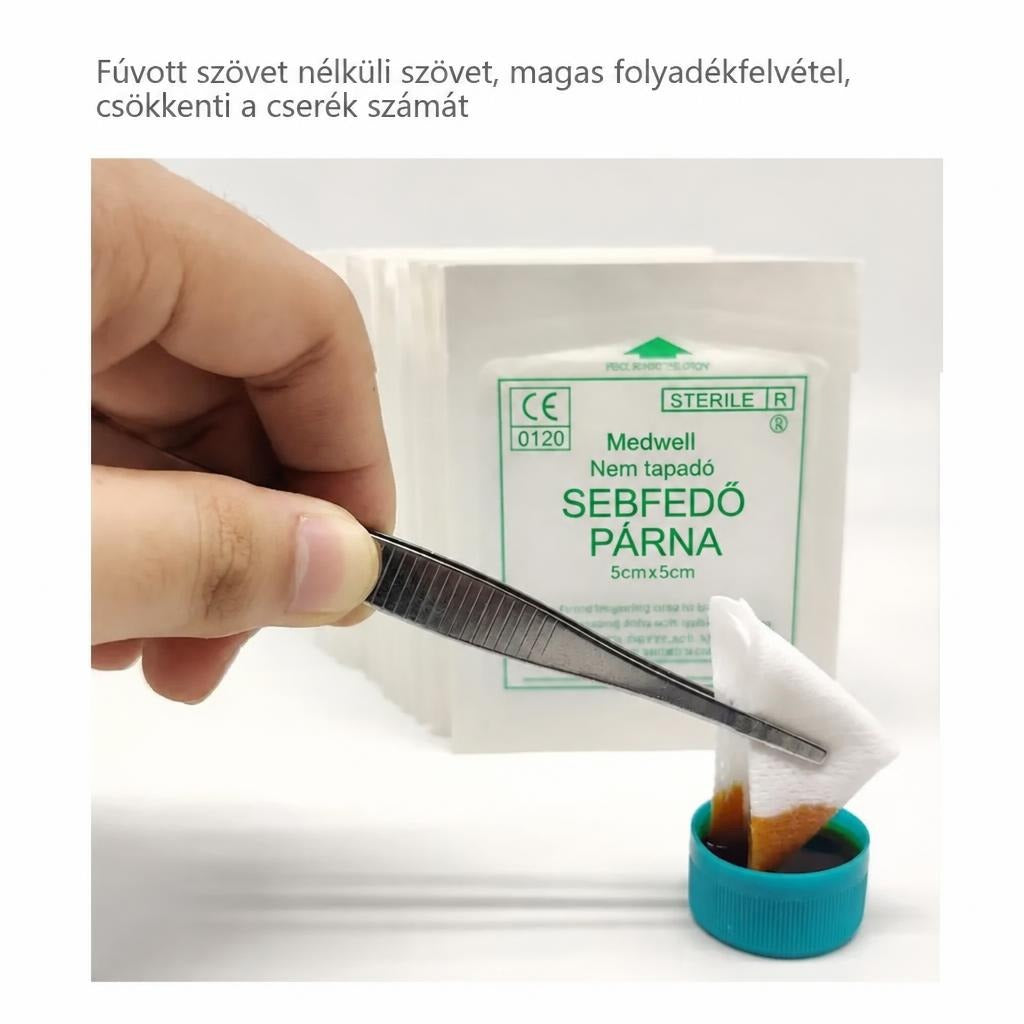 Nem tapadó sebfedő párna folyadékfelszívásának bemutatása csipesszel.