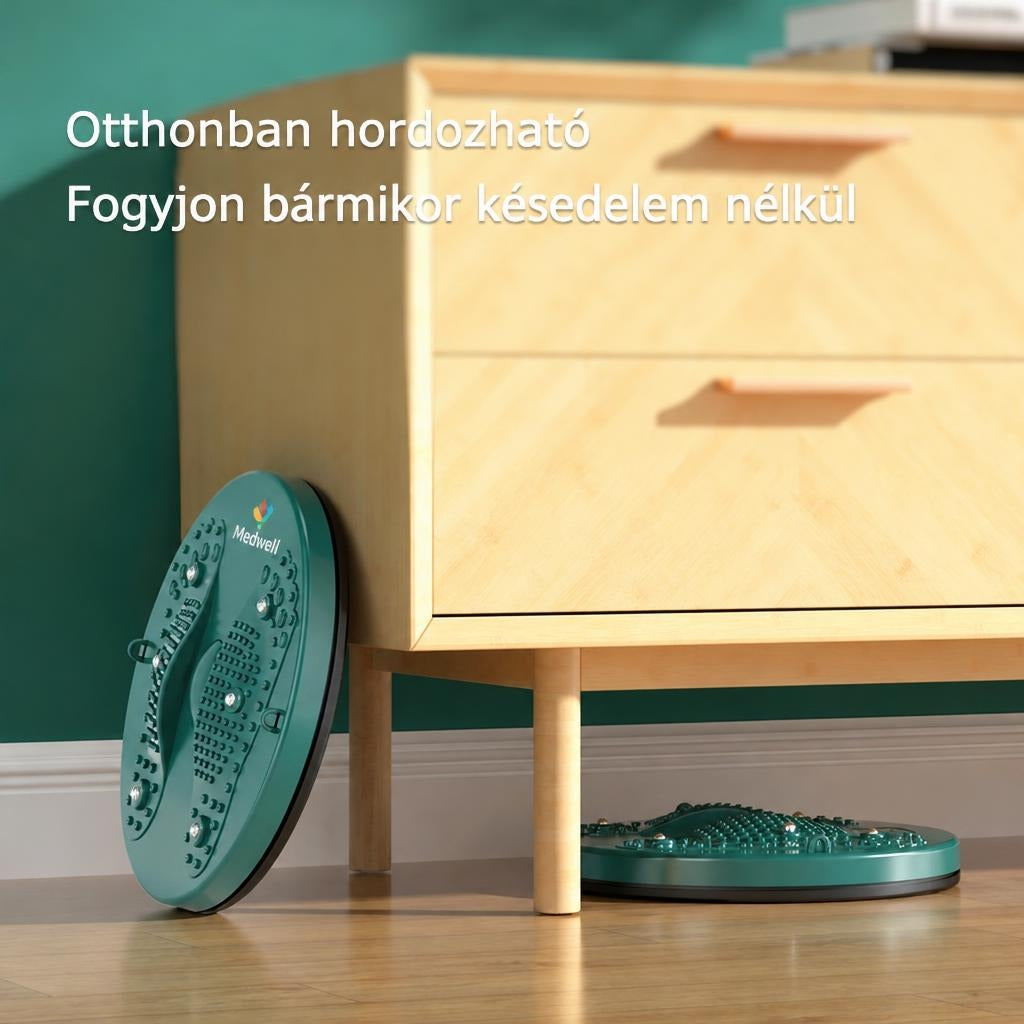 Hordozható Medwell forgó fitneszkorong egy fiókos szekrény mellett a padlón.